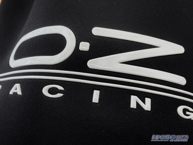 OZ RACING シートガードエプロン|ヘッドレストに掛けるだけで汚れを防止! OZ RACINGから立体ロゴ入りシートガードが登場