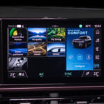 Vehicle settings and drive mode controls displayed on the Tekton’s central touchscreen.